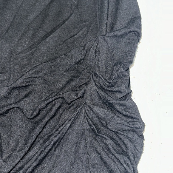 Black bodycon sleeveless dress with lace on shoulders and rushing on left side. - Picture 3 of 4